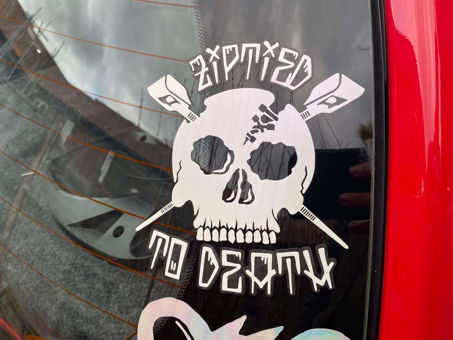 Zip tied to death decal